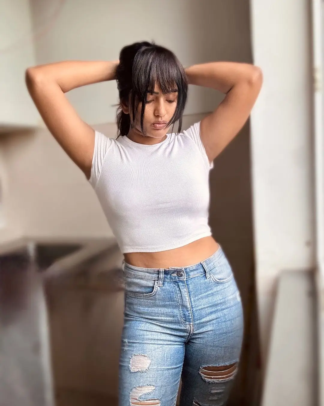 Eesha Rebba Stills in Beautiful White T Shirt Blue Jeans